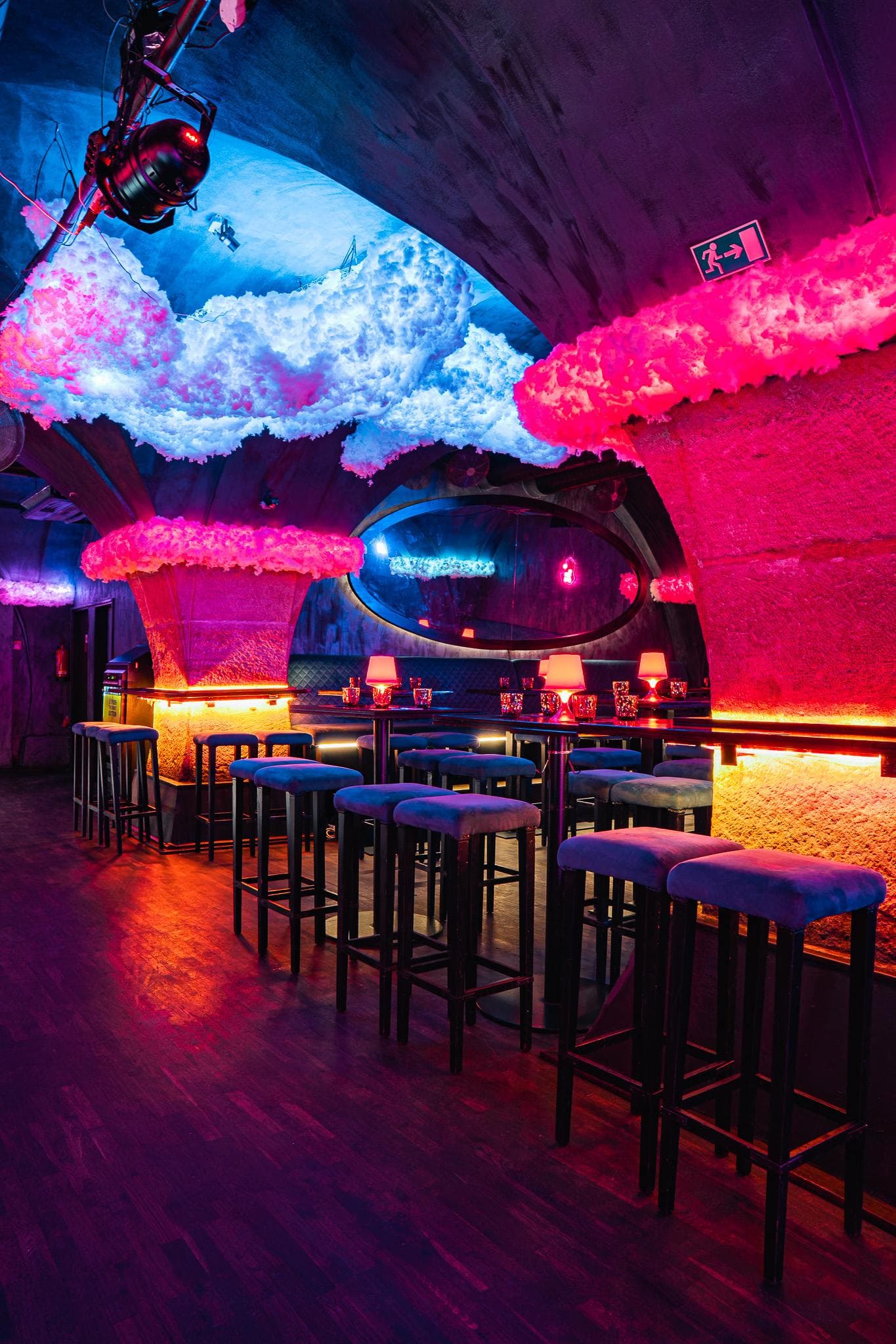 Vaulted hall with the bar and glowing clouds